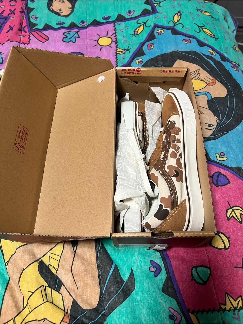 Vans cow print shoes